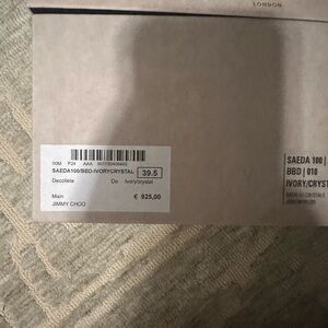 Brand new never worn jimmy choo white pumps